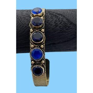 5 tanzenite blue stones on gold plated cuff bracelet